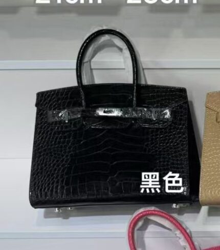 black Hermès Birkin 30 bag likely made of crocodile leather
