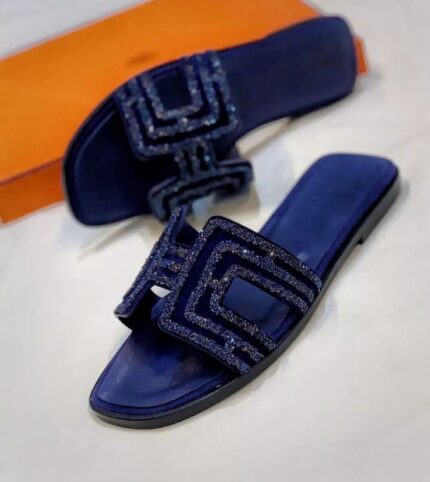 Hermès Oran sandals in Bleu De Prusse calfskin leather embellished with blue crystals