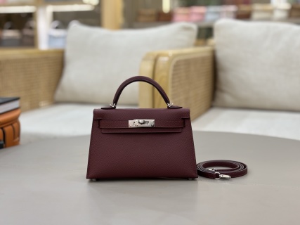 Hermès Kelly bag in a dark red or burgundy grain leather