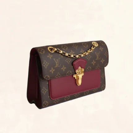 Louis Vuitton Victoire Monogram canvas and raisin leather shoulder bag