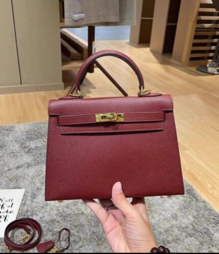 Hermès Kelly handbag in a red