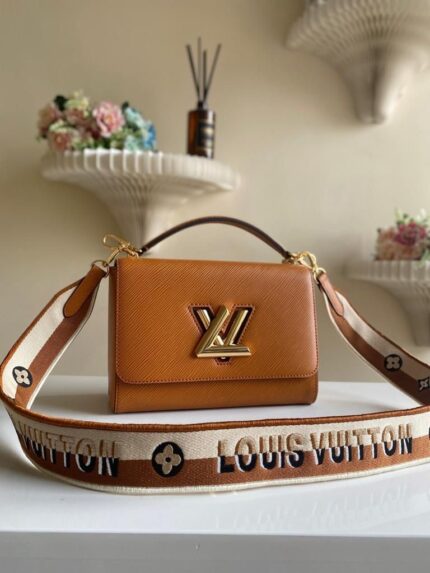 Louis Vuitton Twist MM handbag in Epi leather