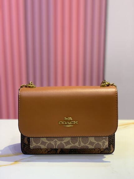 Coach Klare crossbody bag in signature canvas and smooth leather