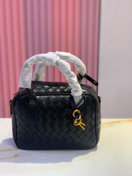 Bottega Veneta Lambskin Intrecciato Small Getaway top-handle bag in black leather