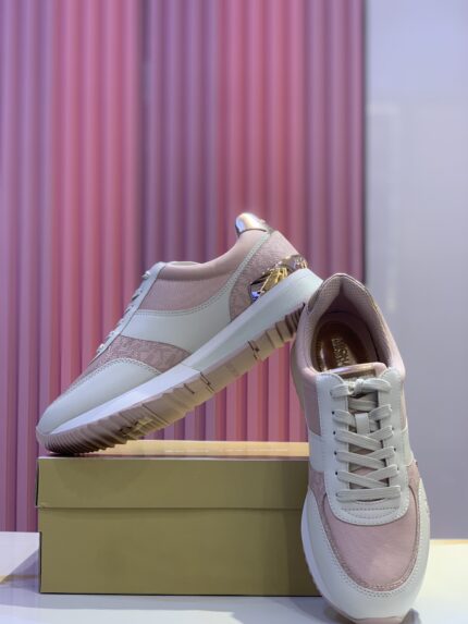 Michael Kors Andi trainers in a white and pink colorway