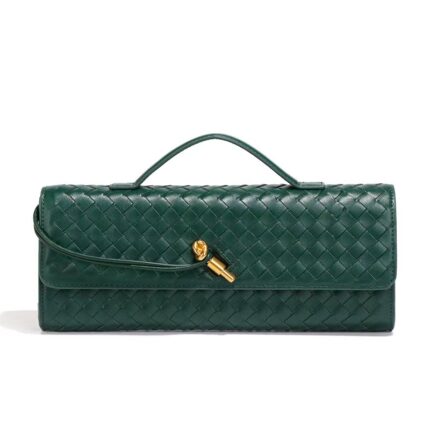 Green woven clutch bag with a top handle and a gold mortise lock closure