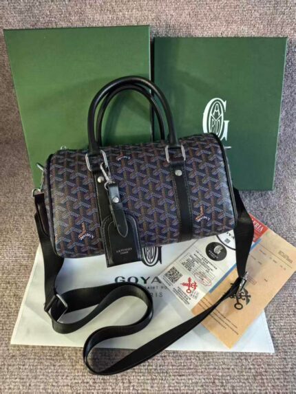 Goyard Boston bag, a travel duffel bag in the signature black Goyardine canvas with black leather trim.