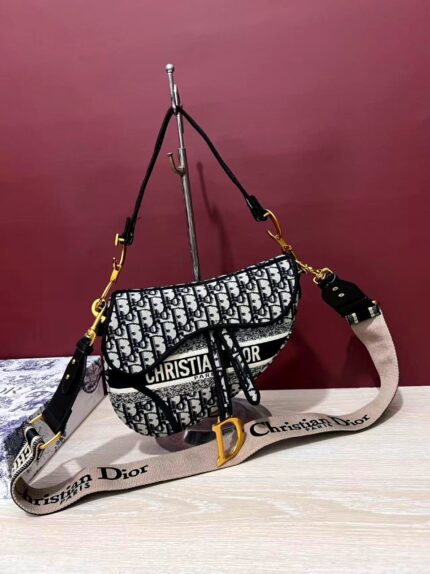 Christian Dior Saddle bag in the black and white Dior Oblique canvas