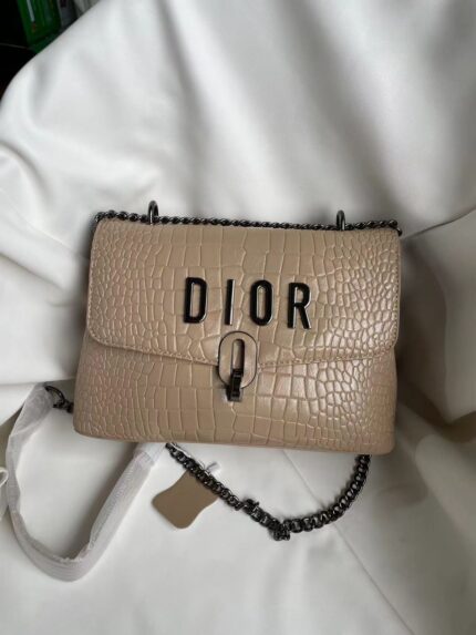 Dior shoulder bag with a textured finish and a chain strap