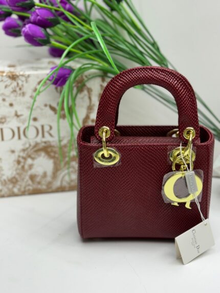 Lady Dior handbag in burgundy lambskin with cannage stitching