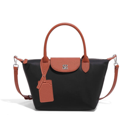 Black Longchamp Le Pliage Original handbag in a small or mini size.